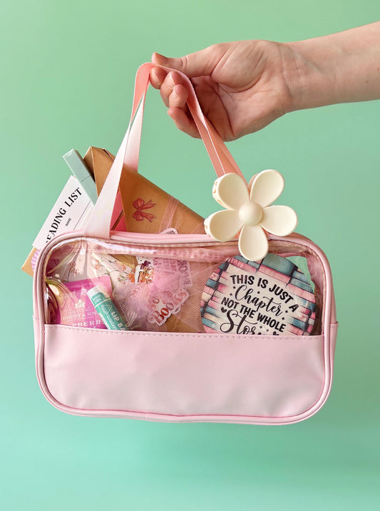 Blind date with a book beach bag features a mystery book wrapped in kraft paper, packed in a small water-resistant tote with reading log, annotation tabs, smut stickers, tea, cookies, and fantasy bookmark. This custom book box is the perfect gift for book lover friends, romantasy merch fans, and Kindle Paperwhite readers. Great as a summer treat yourself surprise box, wife gift box, smut box, or mystery box for women who love blind book dates and bookstagram vibes.
