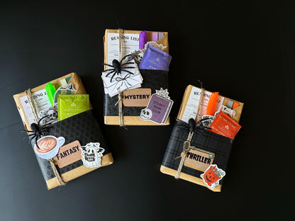 This spooky Blind Date with a Book box offers a book lover&#39;s perfect gift. It includes a surprise wrapped book, reading log, and unique accessories like a romantasy sweatshirt sticker and fantasy bookmark. Ideal for fans of mystery books, dark romance books, or fans of smut stickers and mystery box vintage gifts. Treat yourself or gift it to your wife or a friend who loves discovering new, spooky tales. mystery box blind date with a book treat yourself