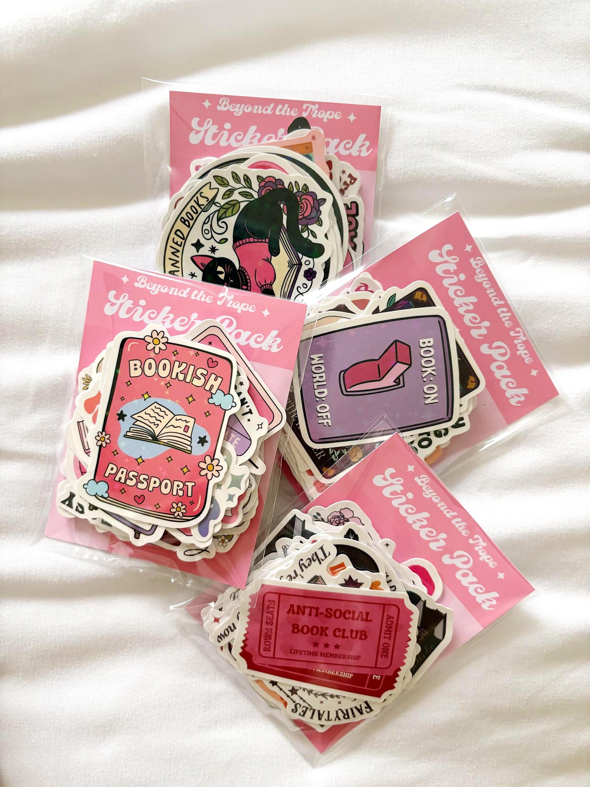 Bulk bookish sticker pack includes 10–50 waterproof vinyl and holographic decals for readers. Great for Kindle paperwhite, Kindle colorsoft, or laptop decals. Ideal for book journaling or cozy booktok gifts. Includes vinyl stickers, book sticker sheet, bookish stickers store, waterproof stickers, booktok stickers, laptop decal, and mystery pack. Dark romance book lover gift.