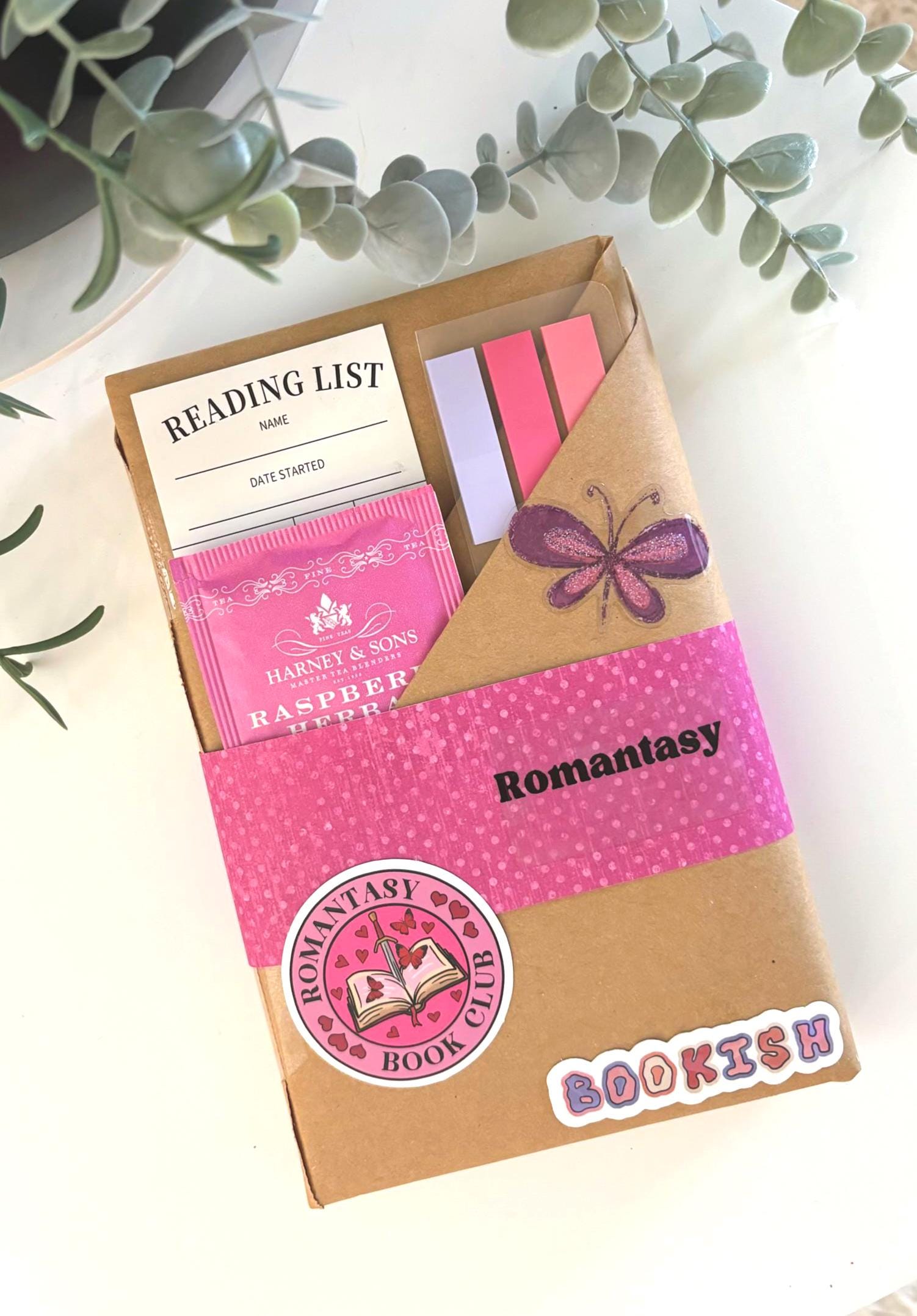 Blind Date with a Book gift for book lovers, featuring a mystery book from genres like romantasy, dark romance, thriller, paranormal romance, sci-fi, and fantasy. Includes book accessories such as bookish gifts, booktok books, book club favorites, and booktok merch. Perfect for fans of spicy romance, smut, erotica, and blind date books. A bookworm gift, surprise reading gift, and ideal gift for readers and bookstagram lovers.